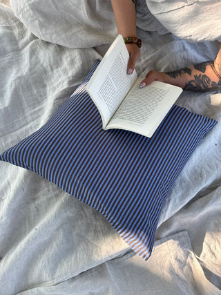 LE COUSSIN À MOTIFS